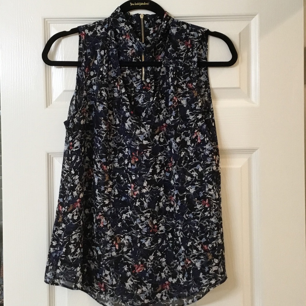 WHBM Multi colored black v-neck blouse. Sz 4